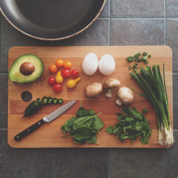 food and knife on a chopping board